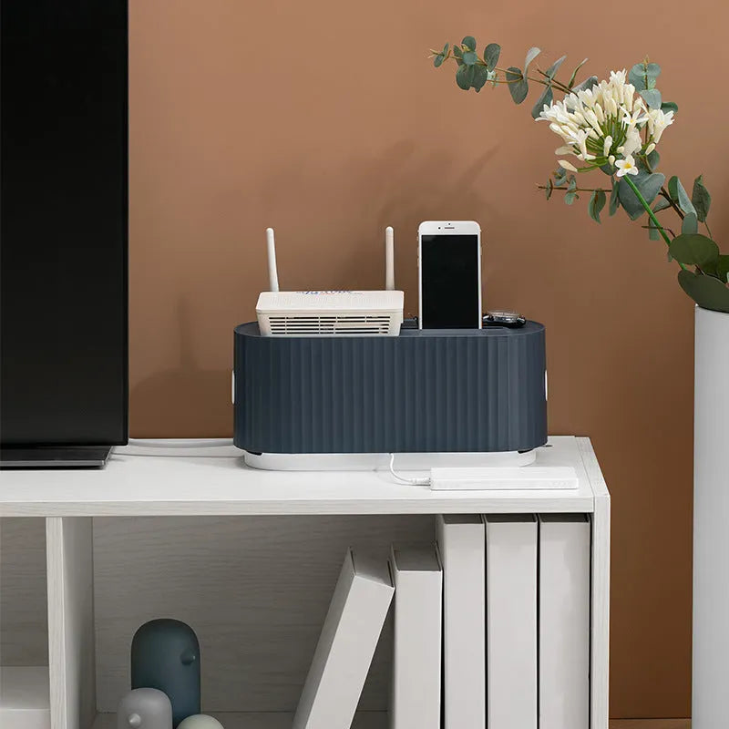 Blue and white HIPS power strip storage box with cable holes and phone slot