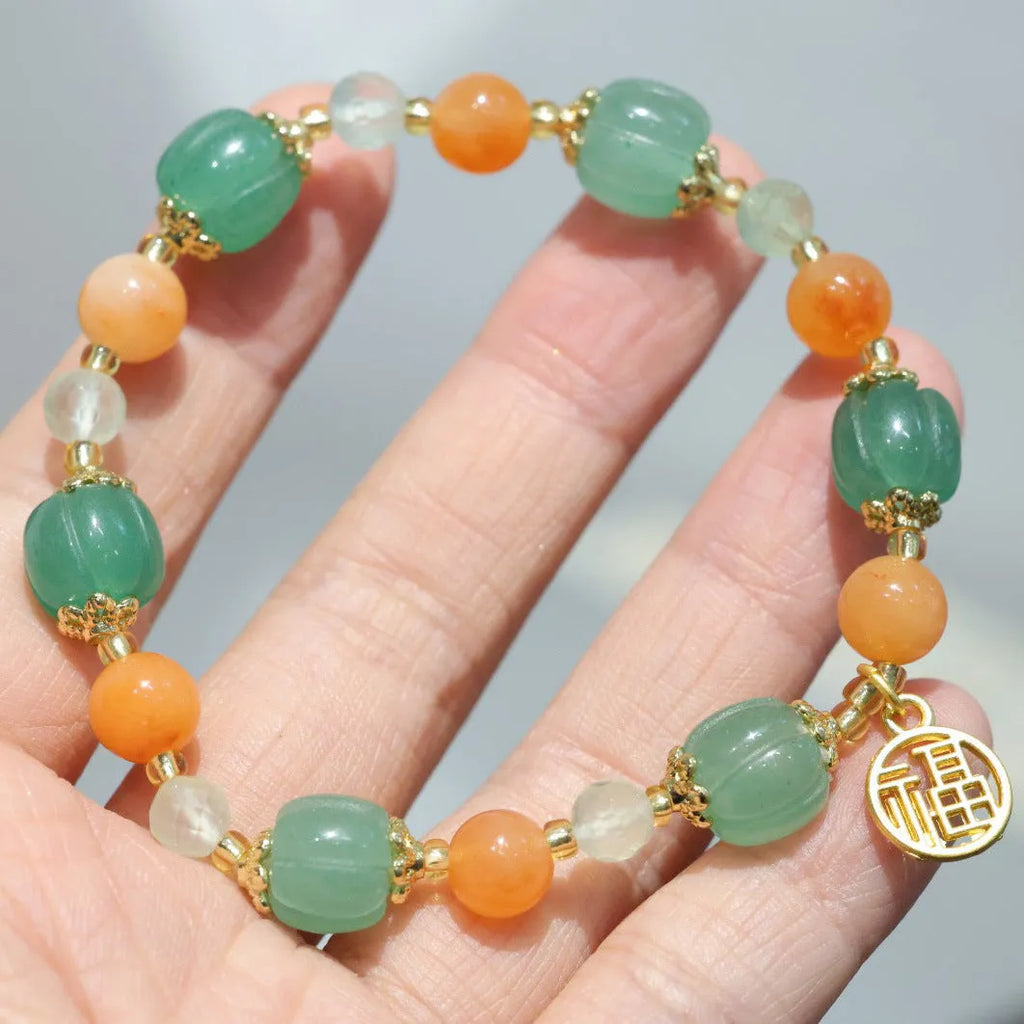 Traditional Chinese Duobao pumpkin bracelet with Jinsi Jade barrel beads and Fuka hanging charm