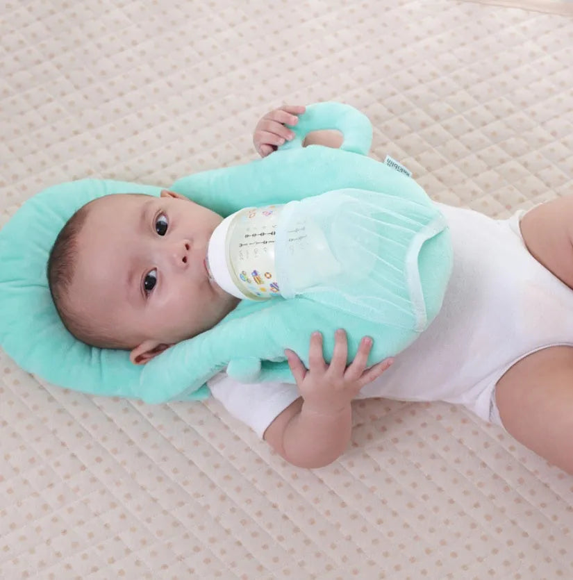Super soft short plush baby feeding pillow measuring 30cm by 42cm in pink colour