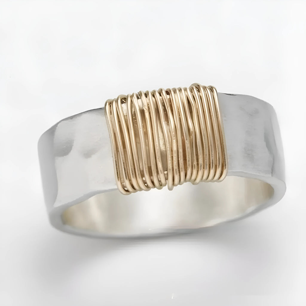 Copper geometric ring with silver golden electroplated finish and irregular vintage coil design.