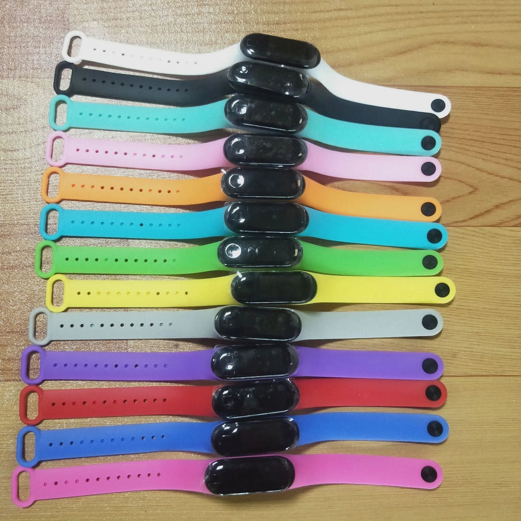 Waterproof touch electronic LED watch with 30mm square plastic case and silicone strap, showing digital display