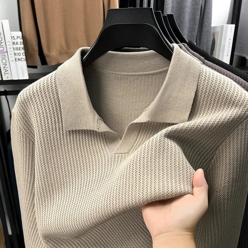 Men's loose-fitting casual pullover sweater in a polyester viscose nylon blend, shown in green.