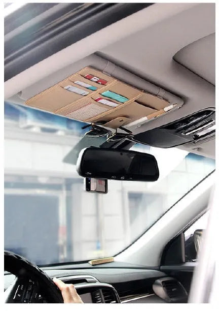 PU leather car sun visor clip organiser in black, grey and beige with slots for phone, sunglasses, CDs, and documents.