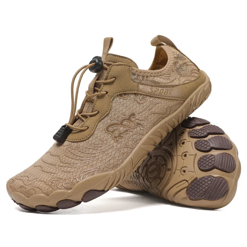 Outdoor hiking shoes with a front strap fastening and a non-slip sole with visible nails.
