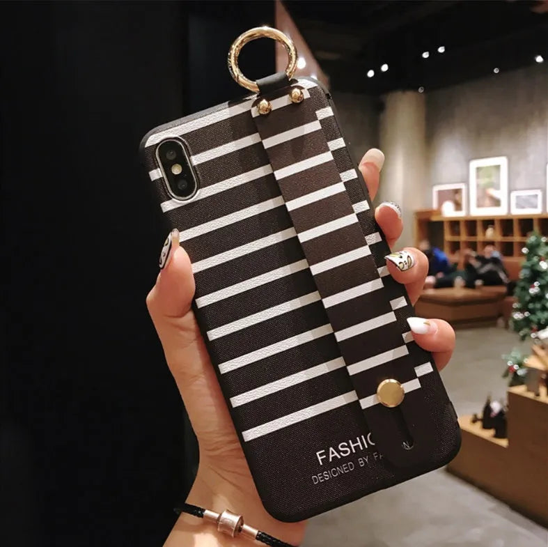 Samsung Galaxy phone case with integrated flip-out bracket grip holder on a simple TPU back cover.