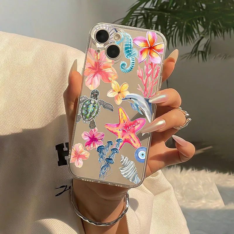 Clear TPU iPhone case with painted dolphin, turtle, plant, and shell design for anti-fall protection.