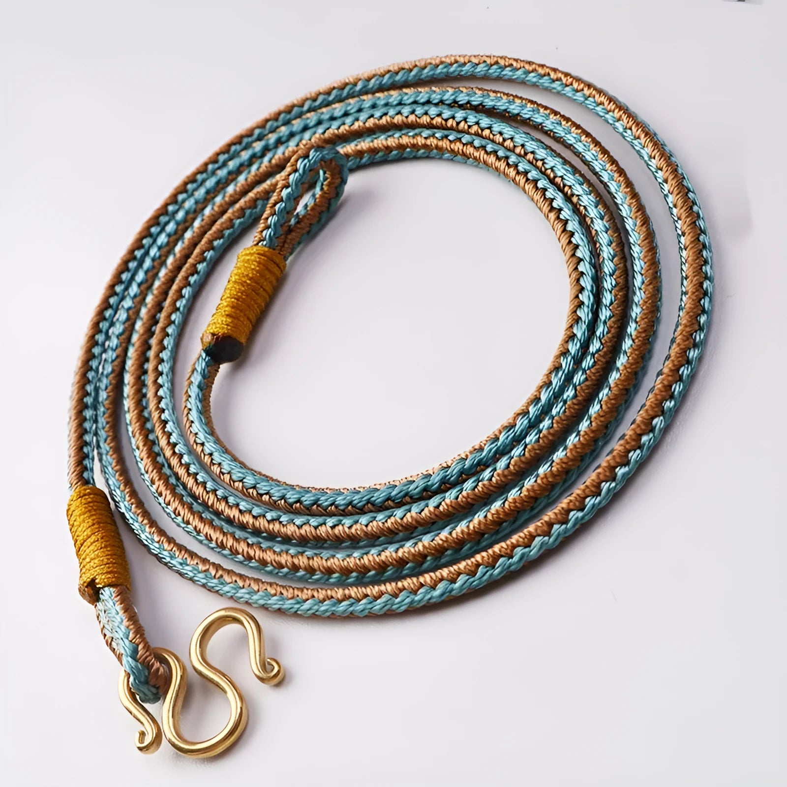 Tibetan Thangka peace buckle necklace with gemstone inlay in gold or silver colour, showing original design pattern