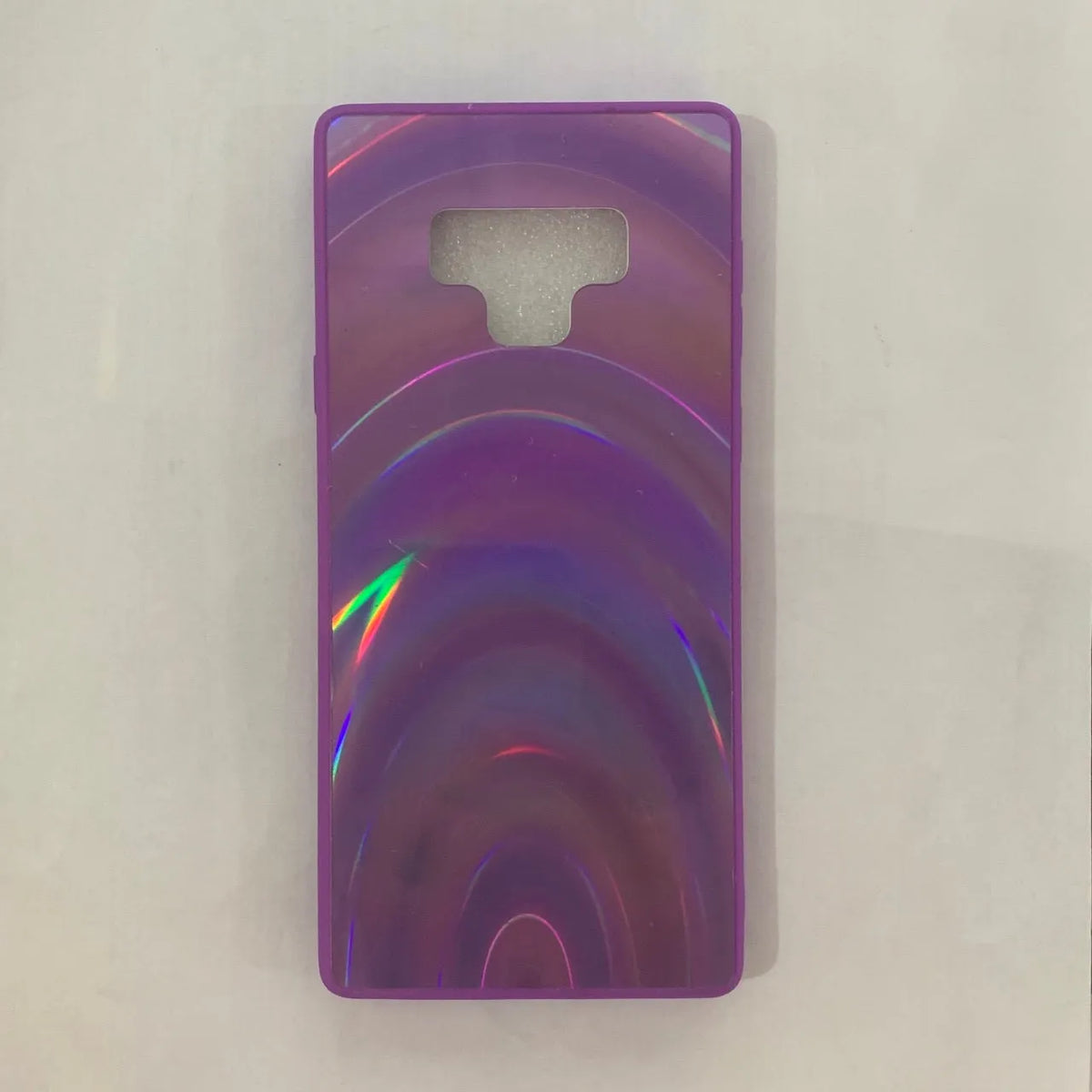 A 3D rainbow glitter gradient back cover case for a smartphone, showing its full-coverage design and sparkling finish.