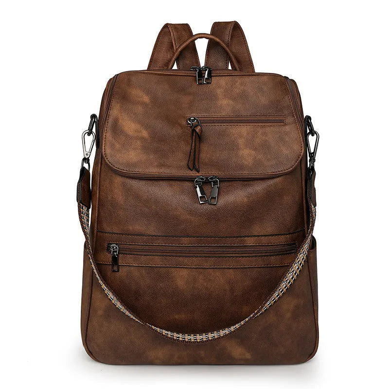 Retro college style PU backpack with curved shoulder straps, shown in one of six available colours.