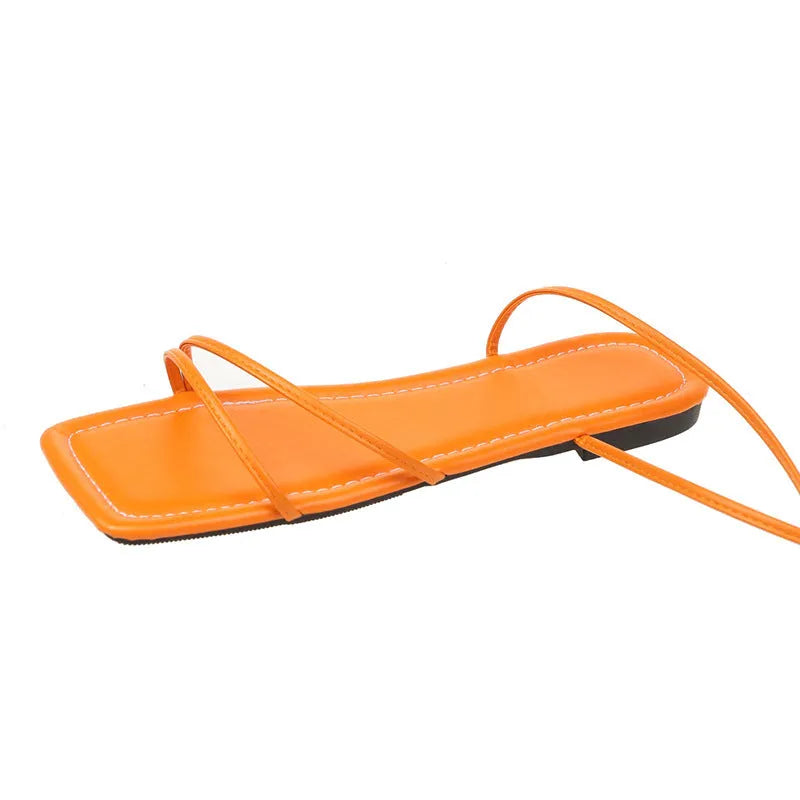 Women's flat sandals with ankle ring bandage cloth and front lace-up, shown in three colours.