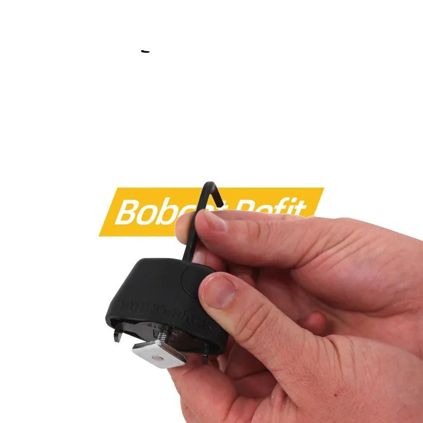 Plastic-sheathed steel cable lock for securing equipment to a roof platform without drilling.