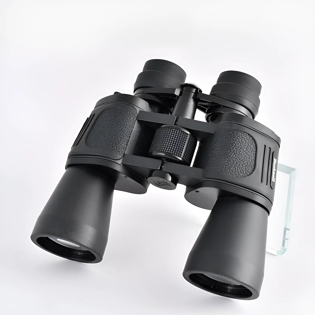 A set of black outdoor telescope binoculars with large objective lenses, shown with a continuous zoom ring on the central bridge.