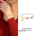 S925 sterling silver bracelet with a blue cold enamel and natural Hetian jade koi fish charm.
