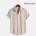 Men's casual solid colour shirt in pink, with pockets, made of polyester fiber, shown on a model.