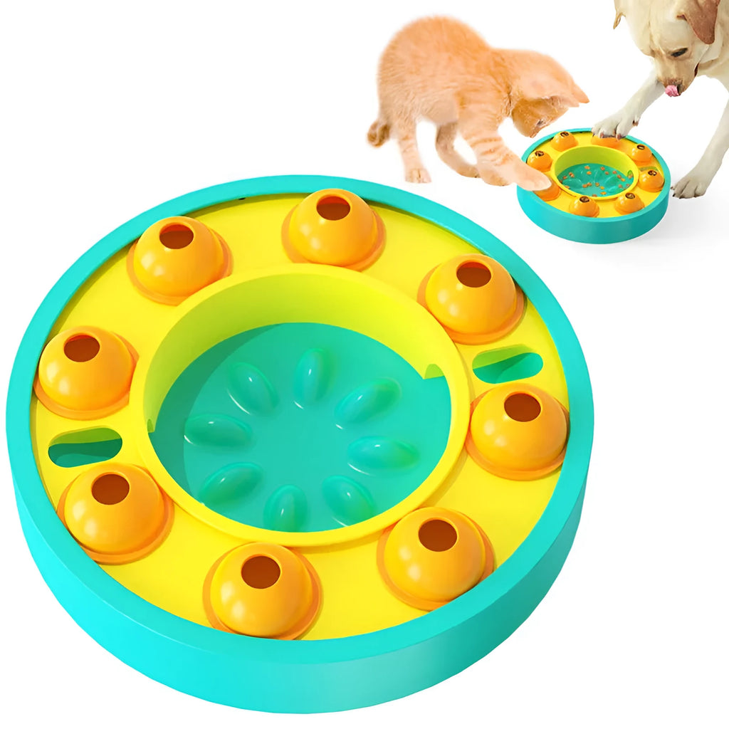 Square green dog puzzle toy with a central feeding well and a rotating turntable lid on a hard floor.