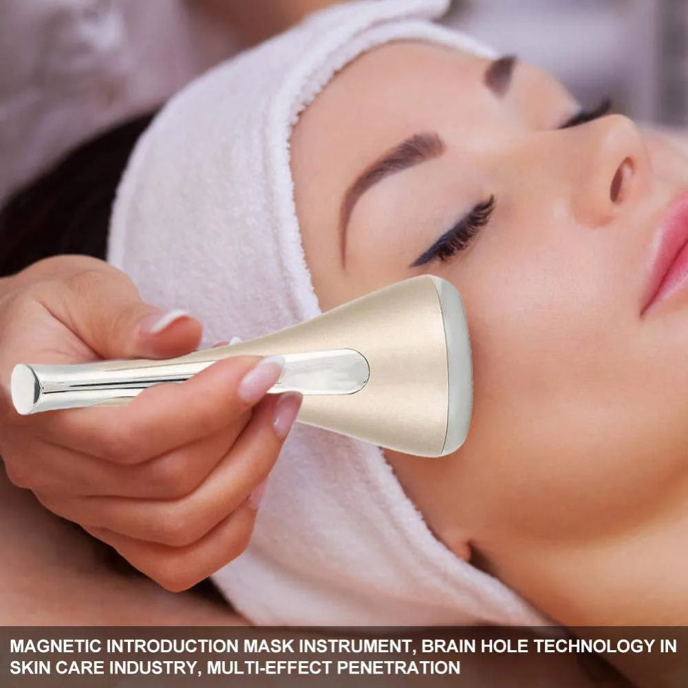 Small dumbbell gyro facial massager in gold, white or pink, 9.8cm ABS body, 1000rpm vibration, 40Gs magnetic force.