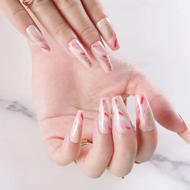 One Second Wearable Manicure set showing 24 blush-coloured false nails with rose, tulip, leopard print, and XINGX patterns and glue.