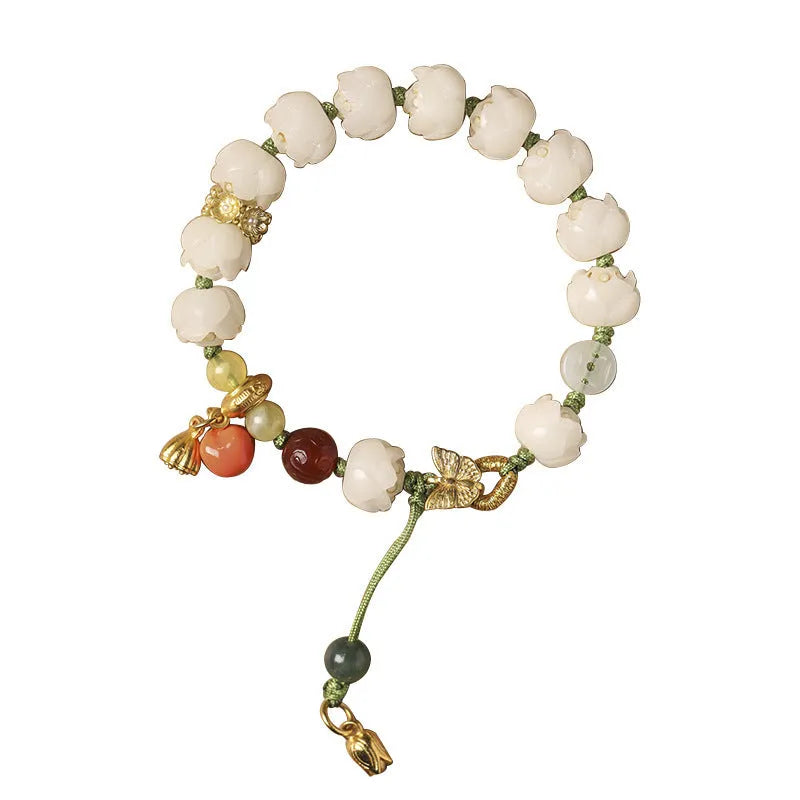 White jade Bodhi bracelet with lotus and pumpkin beads on open rope with ring clasp