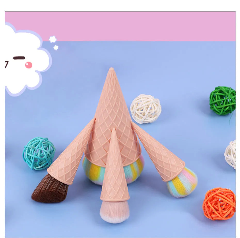 Set of 4 ice cream themed makeup brushes with artificial fibre bristles and plastic handles in paper box