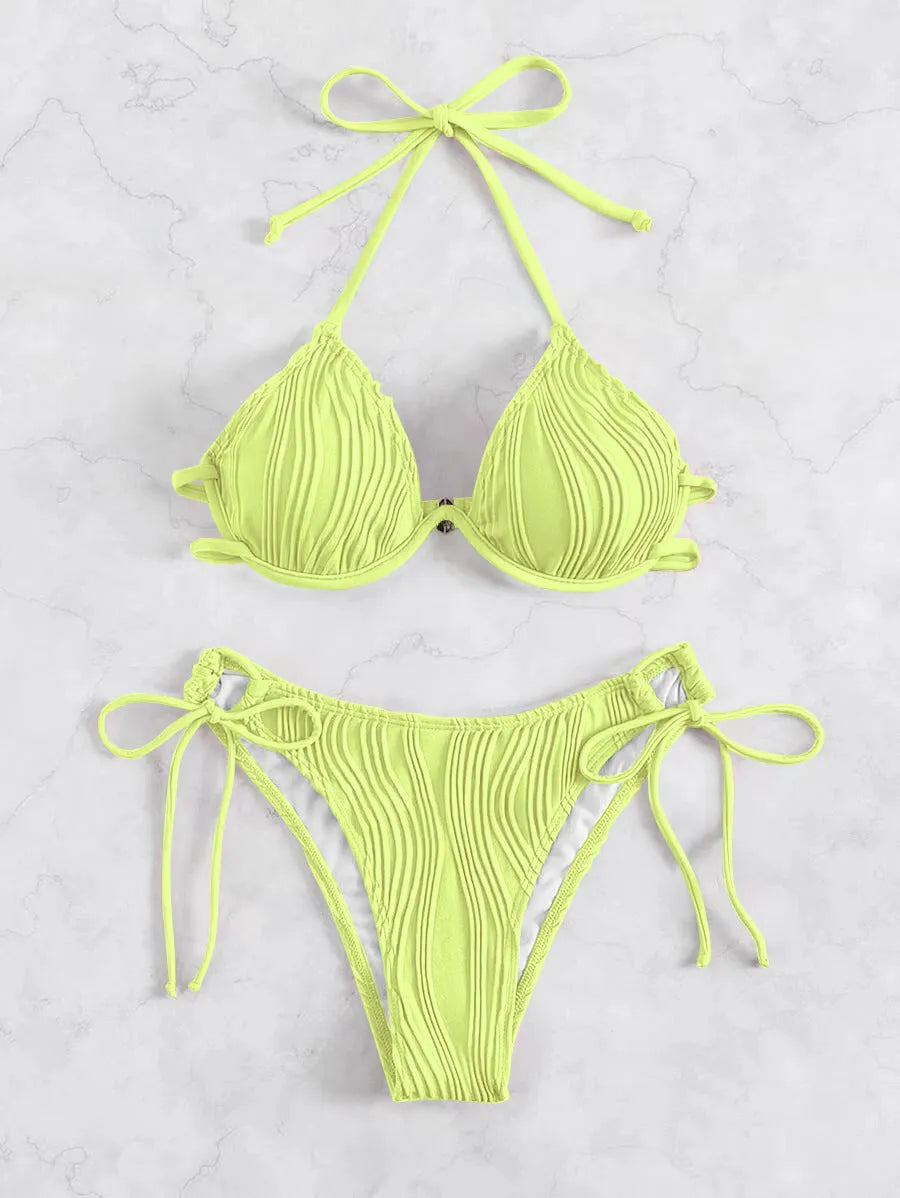 Women's apricot coloured bikini swimsuit with steel underwire bracket on a mannequin.