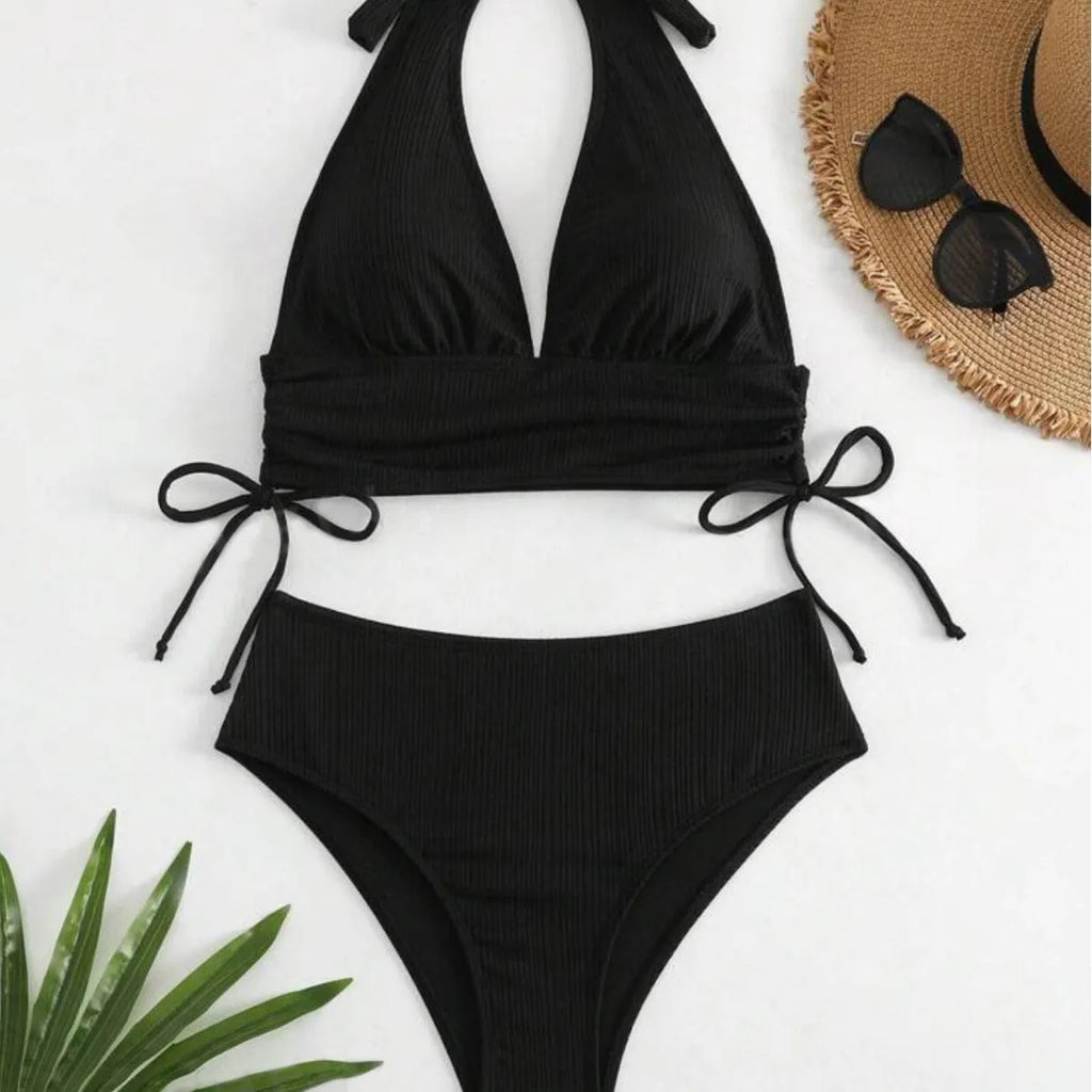 Women's black lace-up halter bikini with high-waisted briefs on mannequin