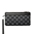 Black men's leather clutch wallet showing plaid lining, closed view
