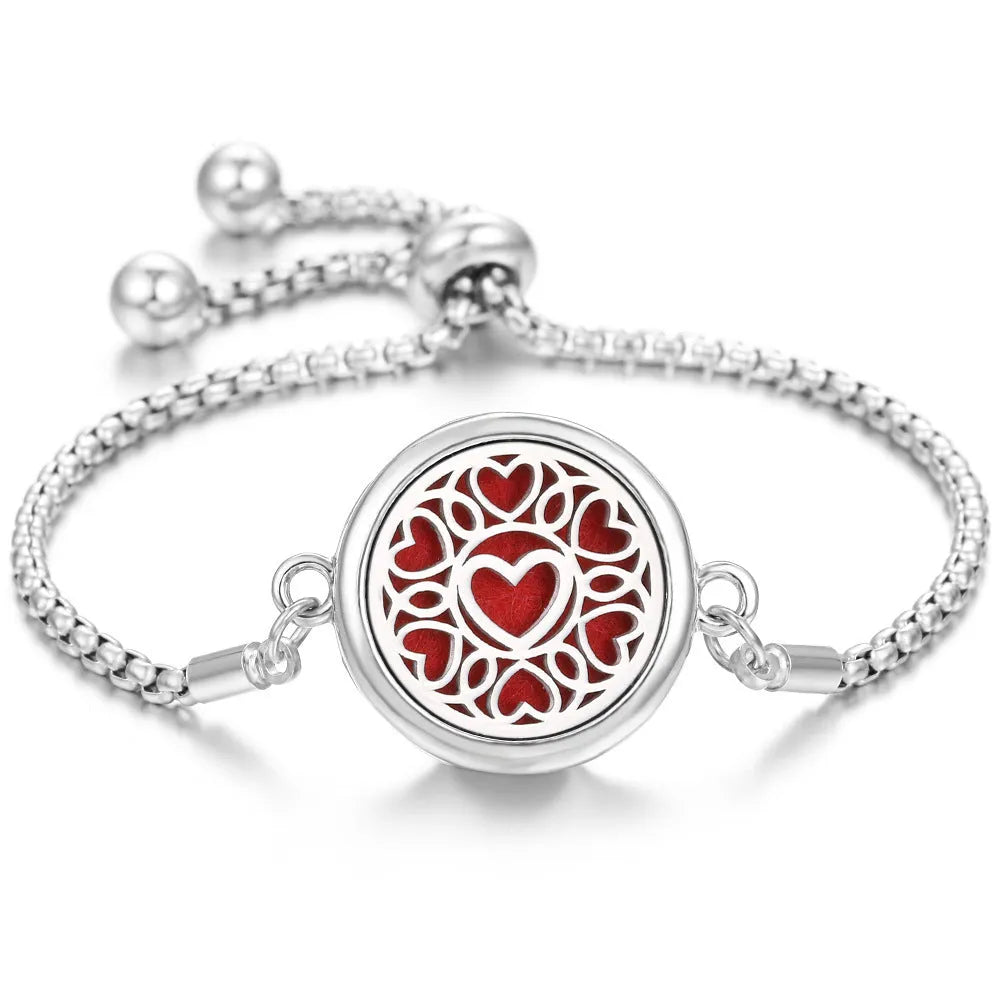 Hollow stainless steel aromatherapy bracelet with electroplated alloy finish, adjustable 24cm length and cotton pad