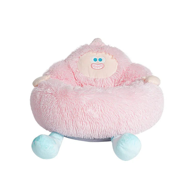 Grey plush pet nest bed with 40cm high sides shown with small dog curled inside