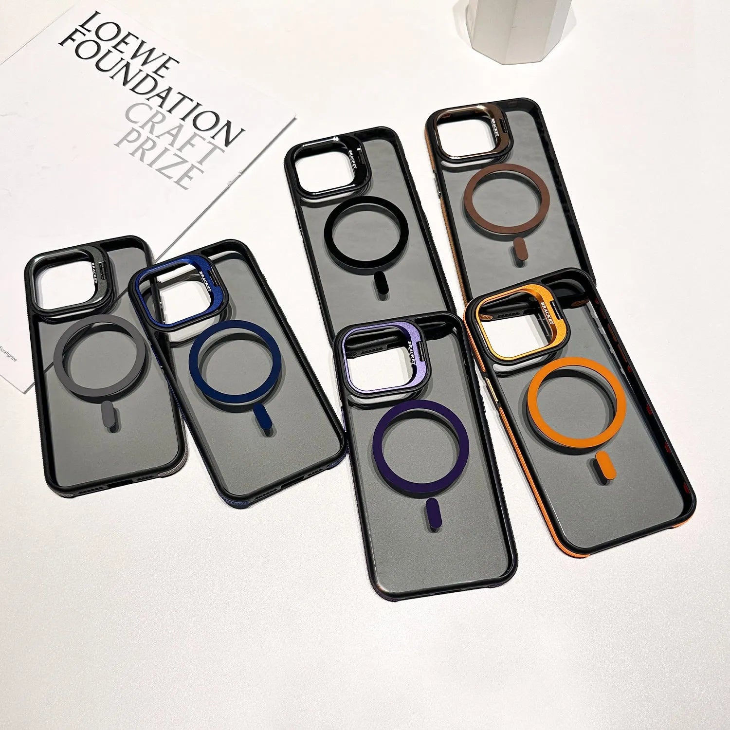 Non-slip transparent magnetic bracket phone case for iPhone showing hidden stand and anti-fingerprint finish