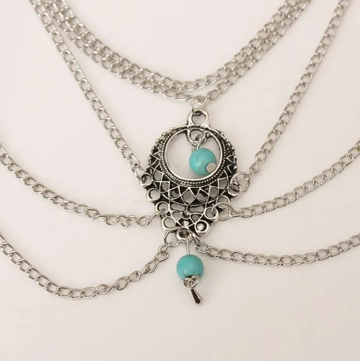 Bohemian chain anklet in Ancient Silver, 21 cm length, 2.3 cm width, on a plain background