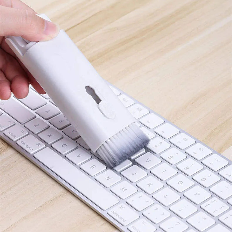 White electronic cleaning kit with cleaning pen, brush, keycap puller and spray bottle for laptops and earbuds