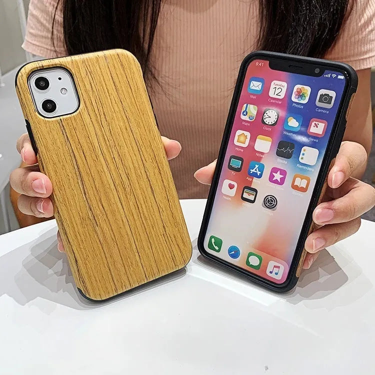 A natural wooden mobile phone case for iPhone, shown in rosewood colour on a table.