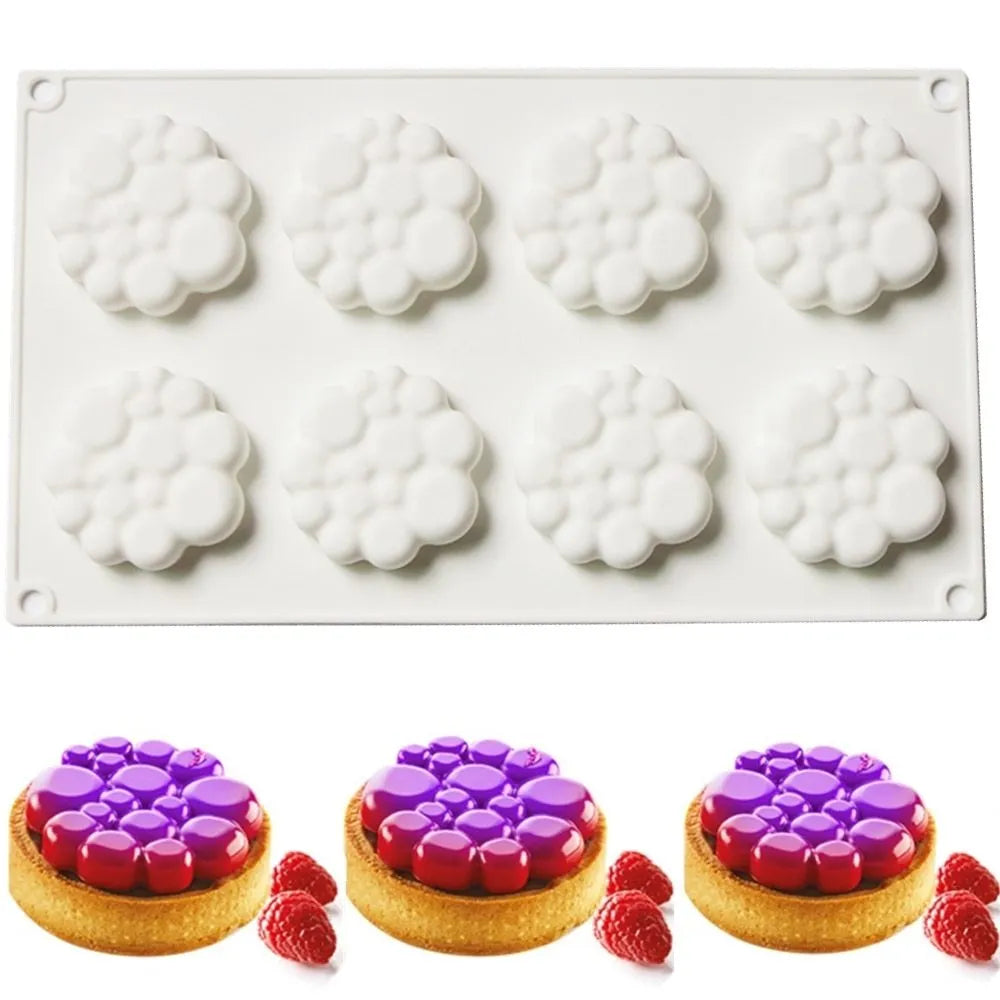 Round silicone cake mould with bubble tower pattern for baking and desserts.