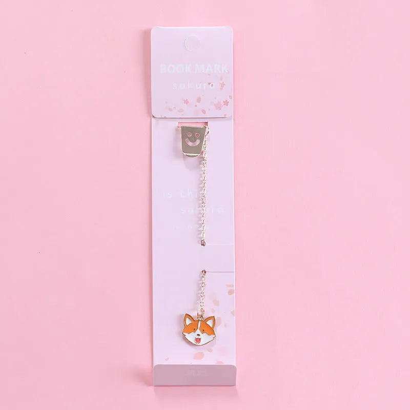 Alloy metal bookmark with cartoon pendant designs including panda, rocket and unicorn variations