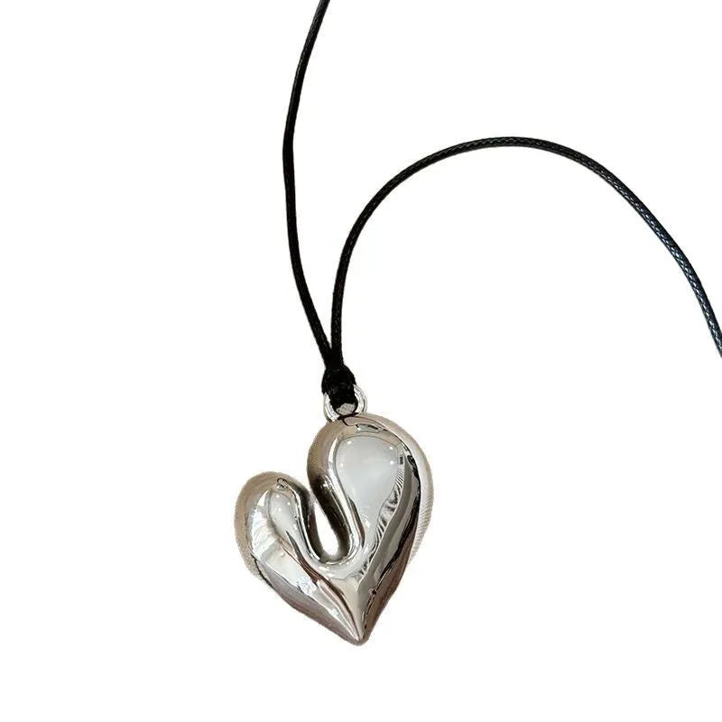 Black rope halter love necklace with acrylic pendant, cross chain style, and adjustable fit for women