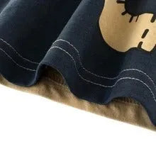 Children's organic cotton t-shirt with animal print in green lion, grey giraffe, or khaki elephant design