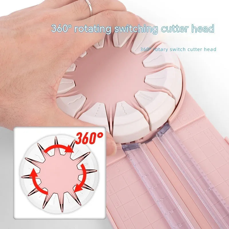 A pink plastic 12-in-1 multifunctional paper cutter with a dotted design on a flat surface.