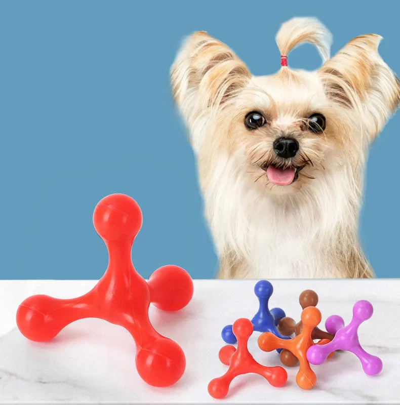 Blue silicone dog chew toy with three legs on a white background.