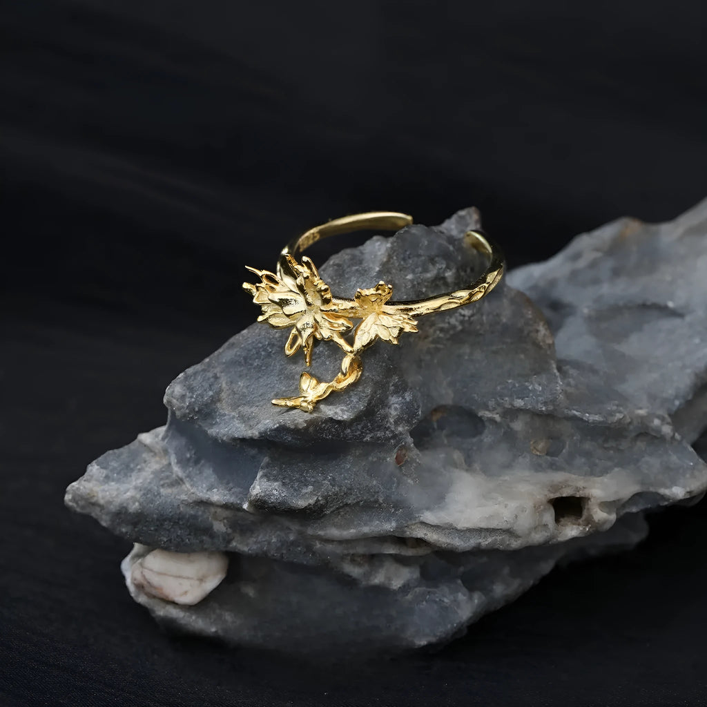 Women's silver butterfly ring with adjustable opening in gold-toned finish