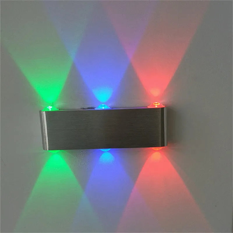 Silver aluminium rectangular wall lamp with LED lighting showing multiple colour options