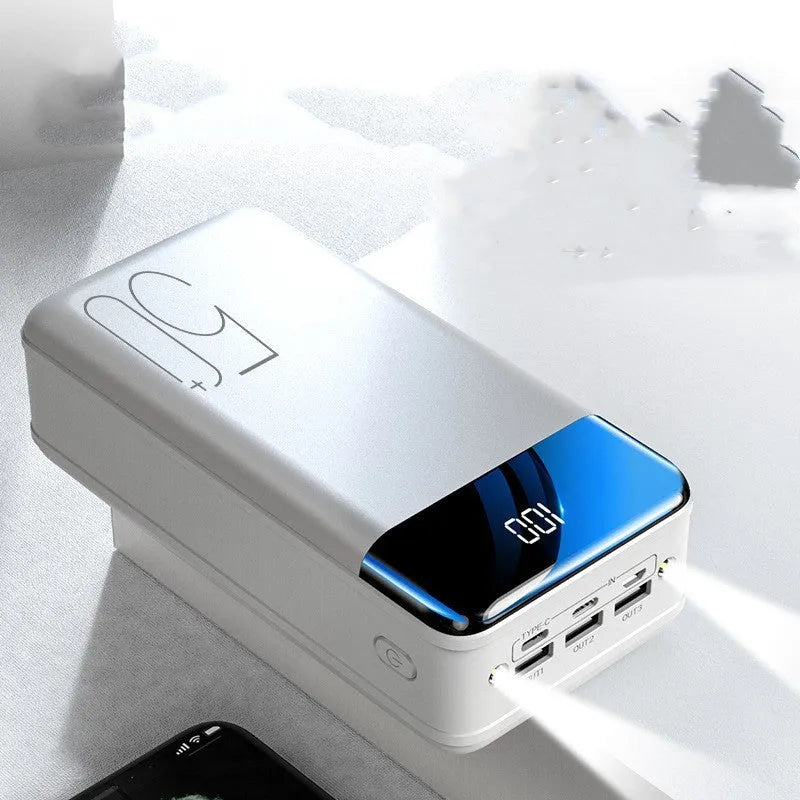 Black and white 50000mAh power bank with three USB output ports, showing dimensions of 169mm x 83mm x 52mm