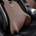 Memory foam car headrest and lumbar support set in grey on a car seat