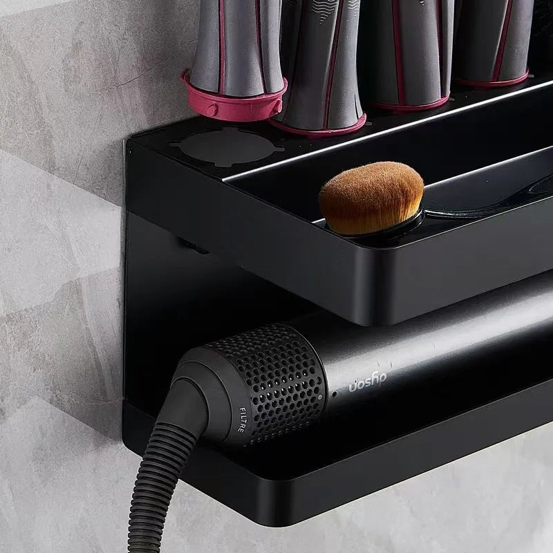 White double-layer aluminium bathroom storage rack mounted on a wall holding hair curlers.