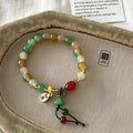 Lotus Ruyi bracelet with mixed materials and handmade construction