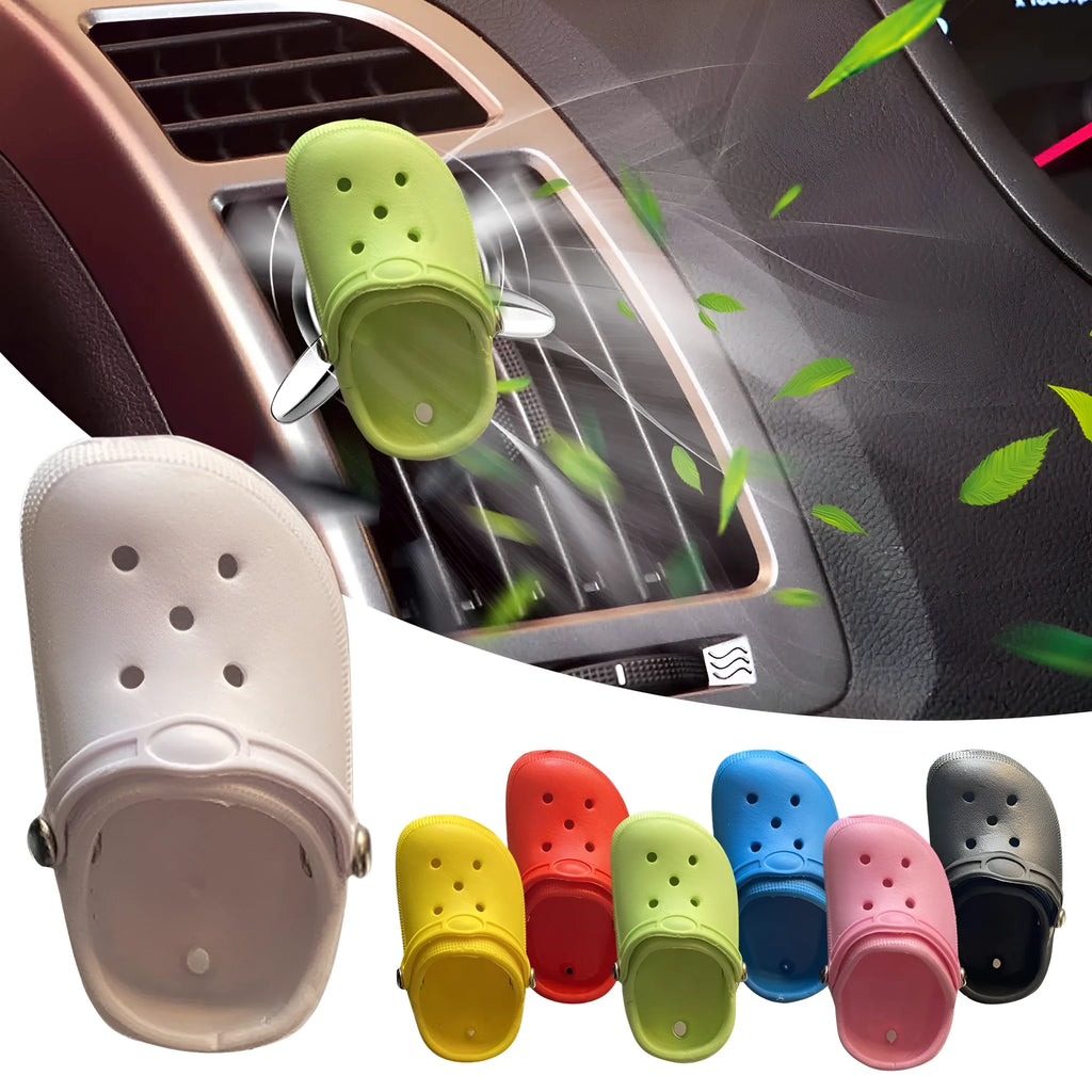 Plastic car air vent aromatherapy cover in seven colour options on a white background.