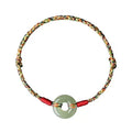 Handmade colourful rope bracelet with peace buckle on woven braided design