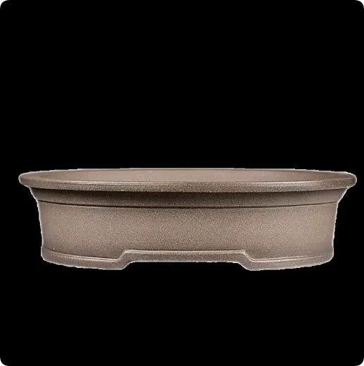 Handmade antique oval bonsai flower pot made from purple sand clay, dimensions 25x21x6.3 cm.