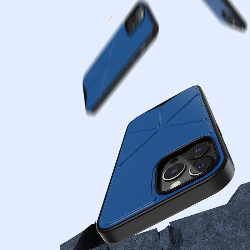 A black minimalist TPU back cover case for an iPhone 13 Pro Max on a table.