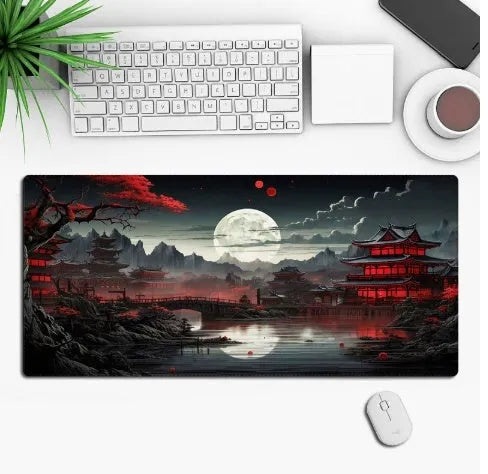 Large black anime-themed gaming mouse pad with non-slip rubber base on a wooden desk.