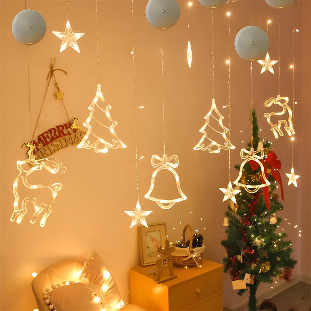 Battery powered LED decorative light with suction cups showing Santa Claus and snowman designs on a window.